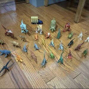 Lot of 30 Jurassic World Figurines & Truck.